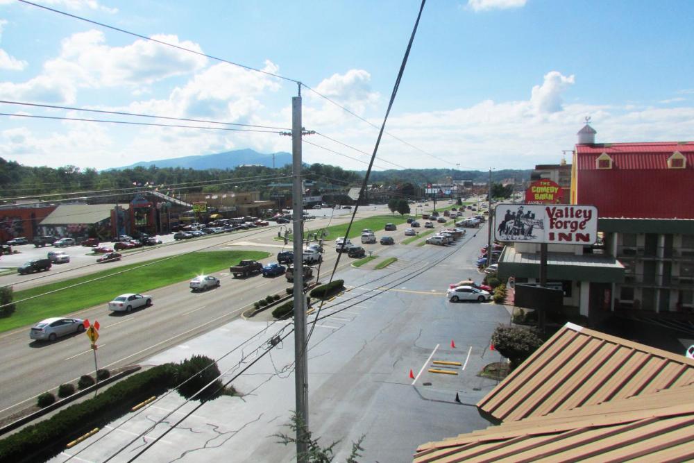 Superior Double Queen Room with Parkway View Shared Balcony with Rocking Chairs interior